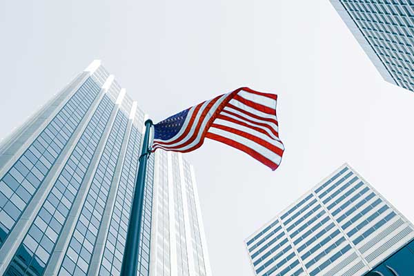 Corporate buildings and American Flag